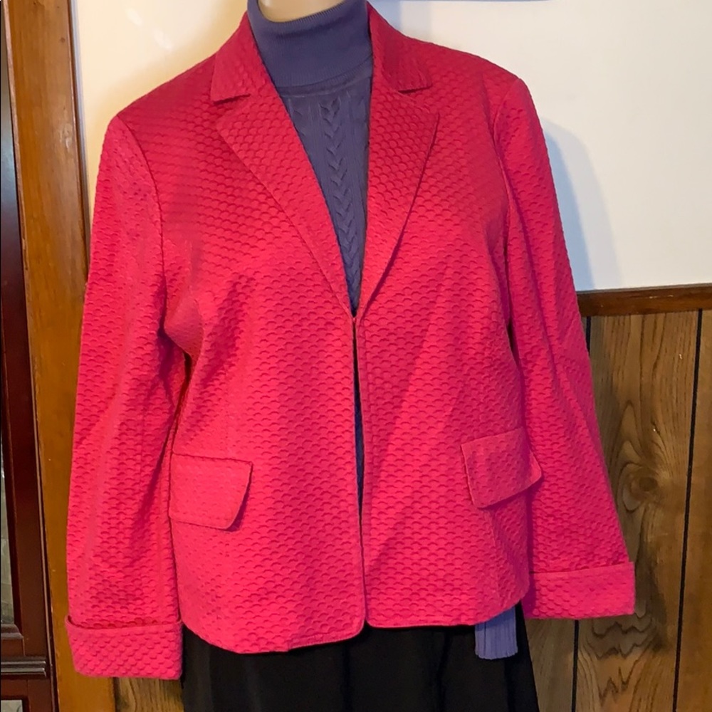 Jones wears blazer